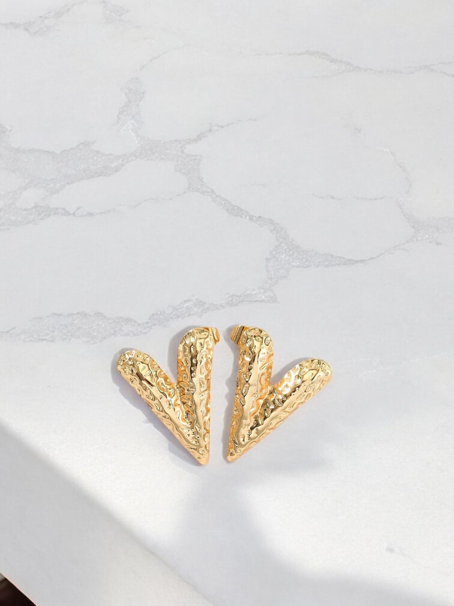 Hammer heart earring