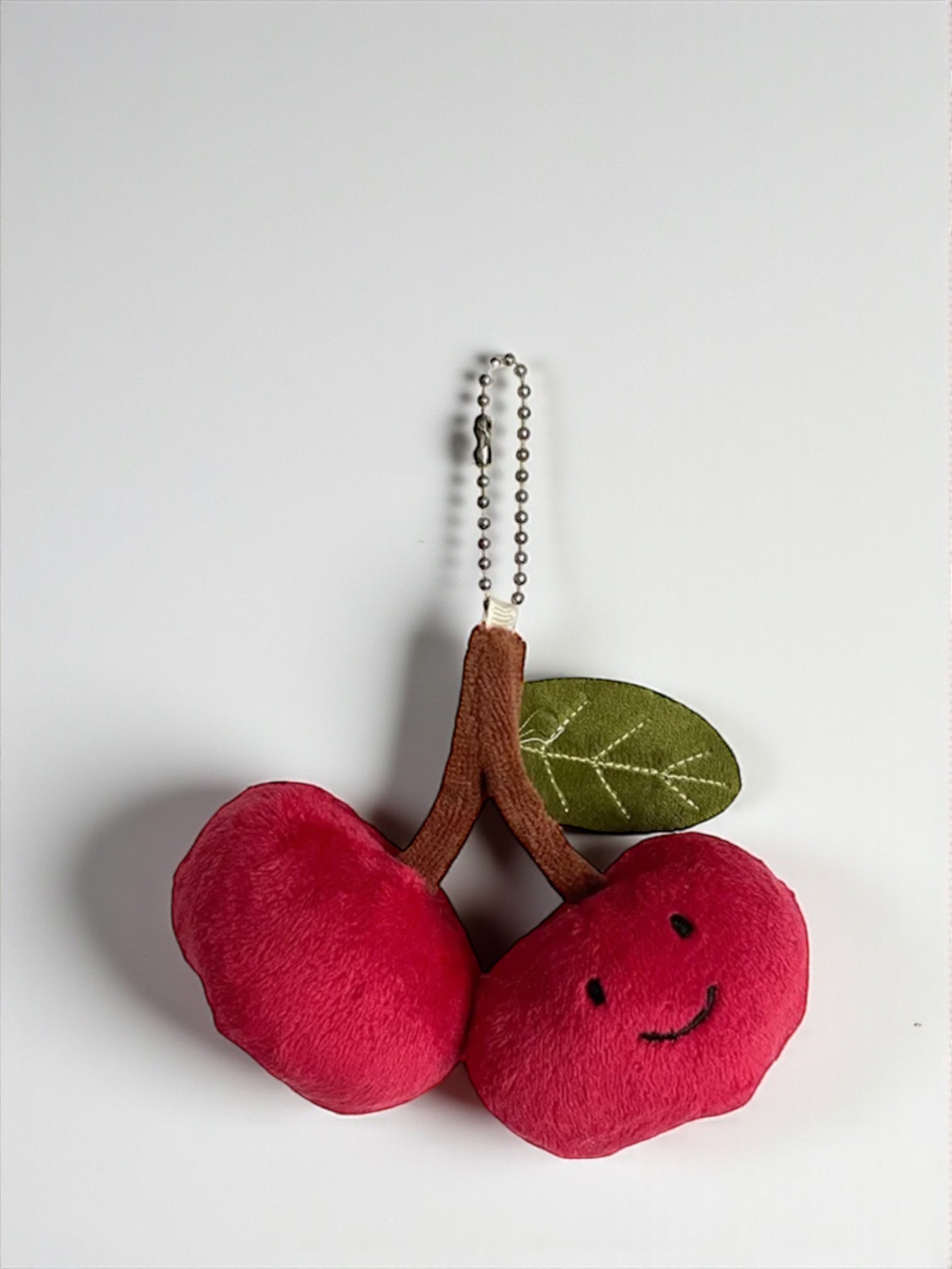 Eye hair cherries charm handbag