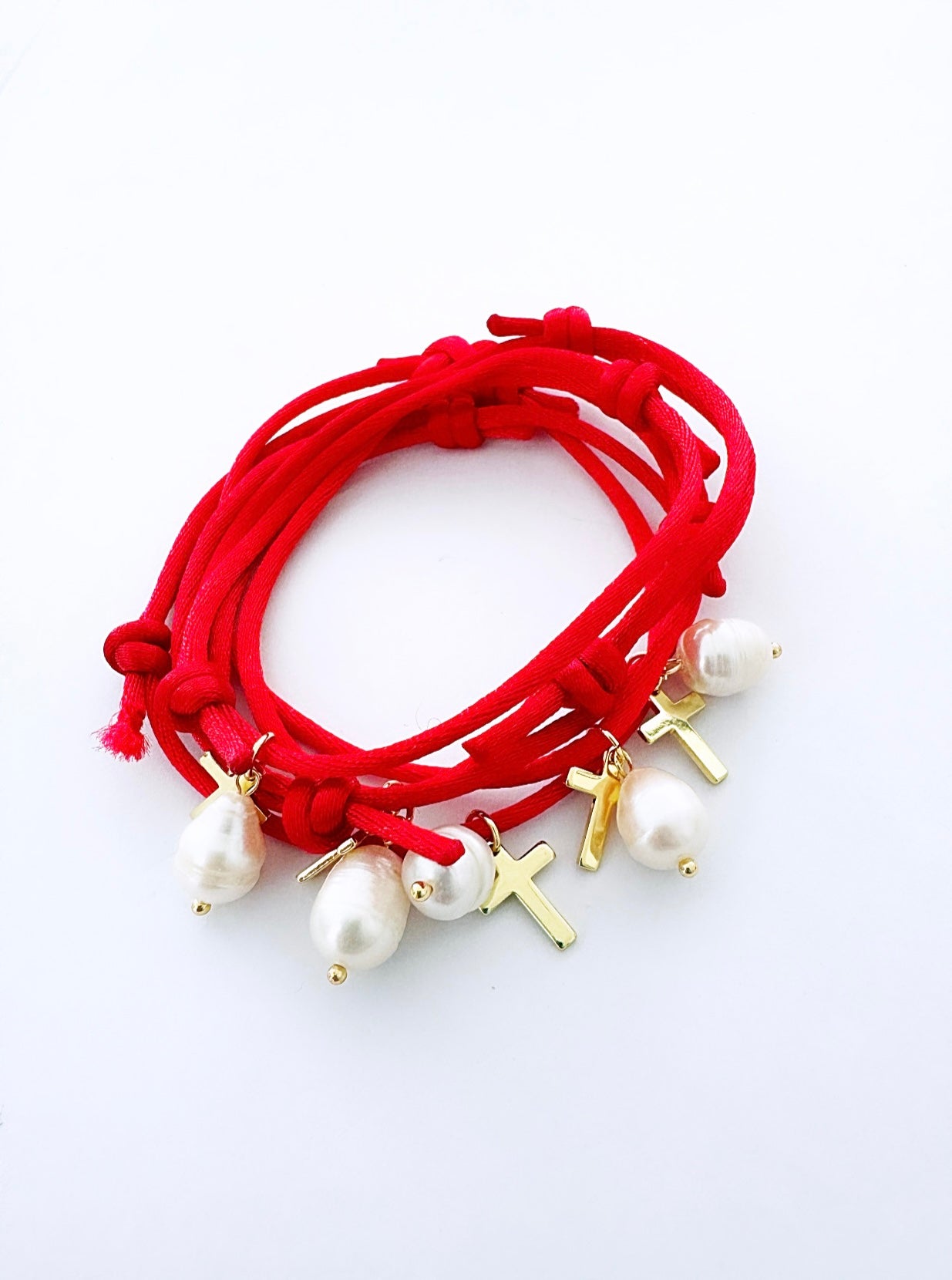 Hilo rojo cross each