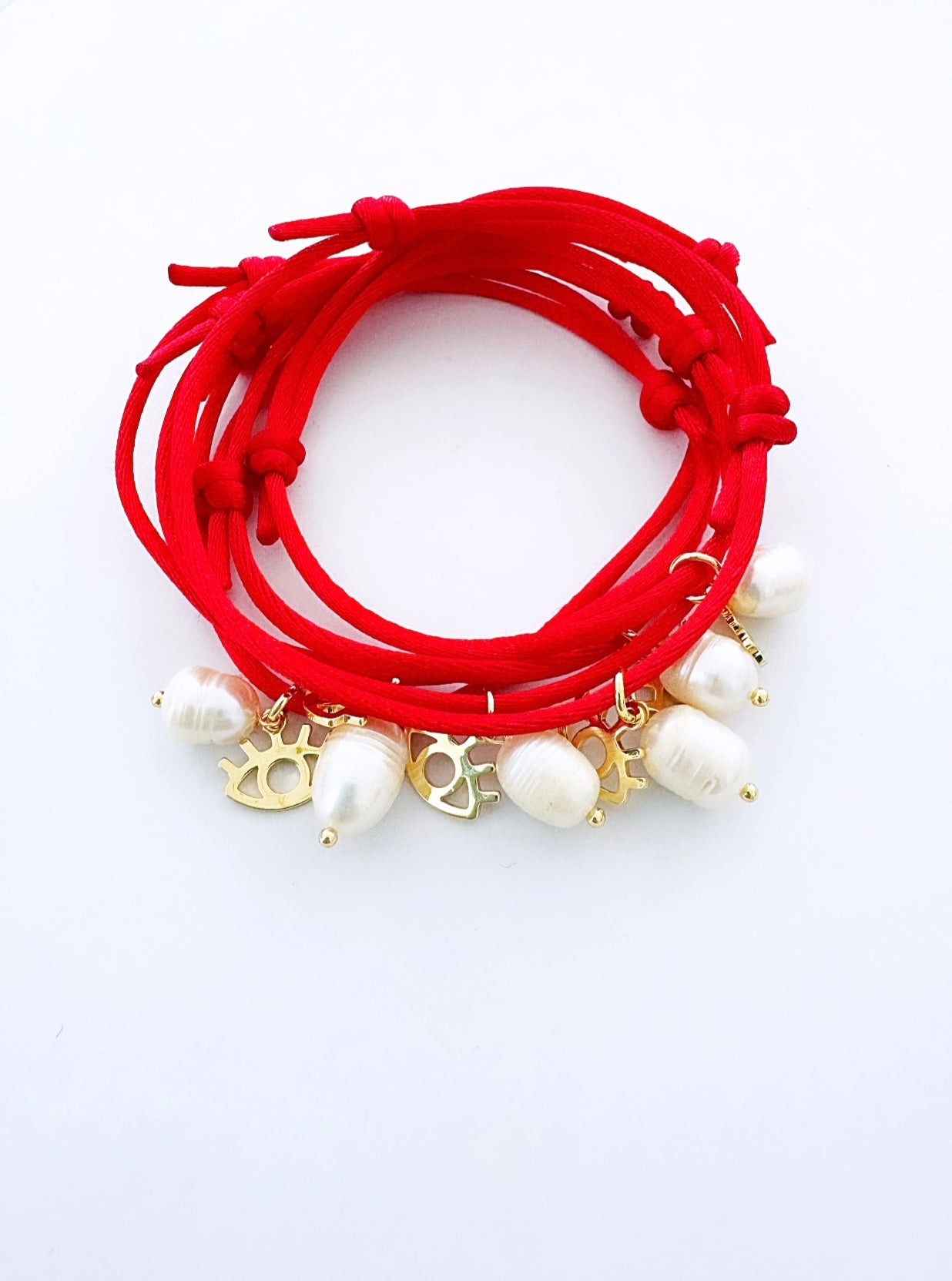 Hilo rojo eye each