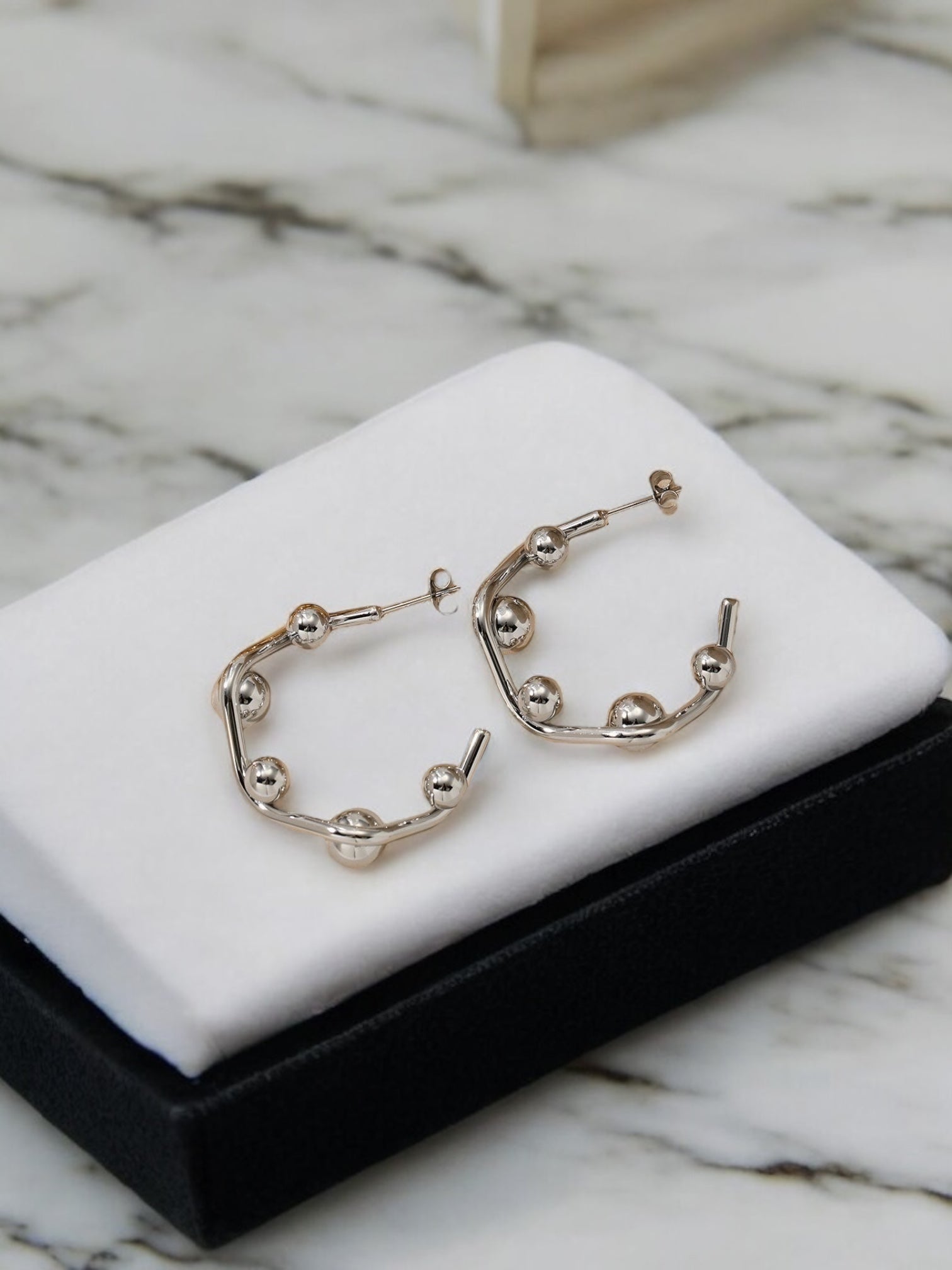 Pellet hoop earring